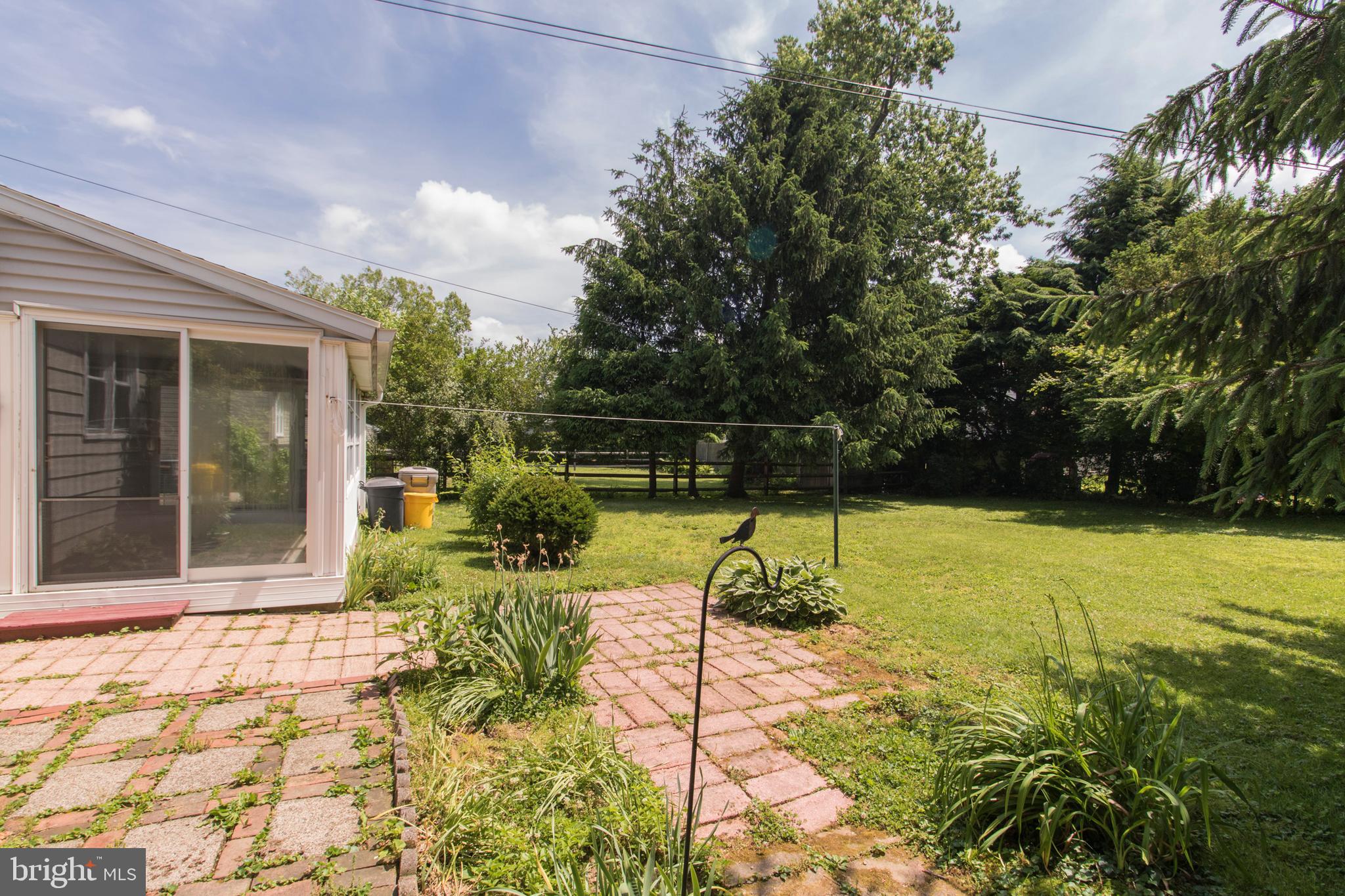 406 Burton Road Oreland, PA 19075 - Photo 40 of 44 Patio outside enclosed porch