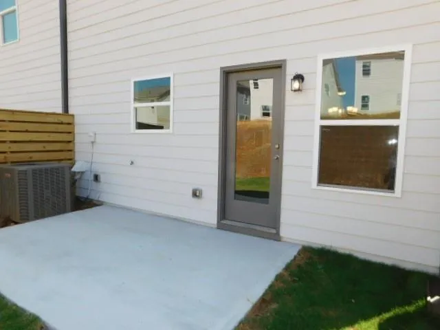 a view of a street with a building in the background