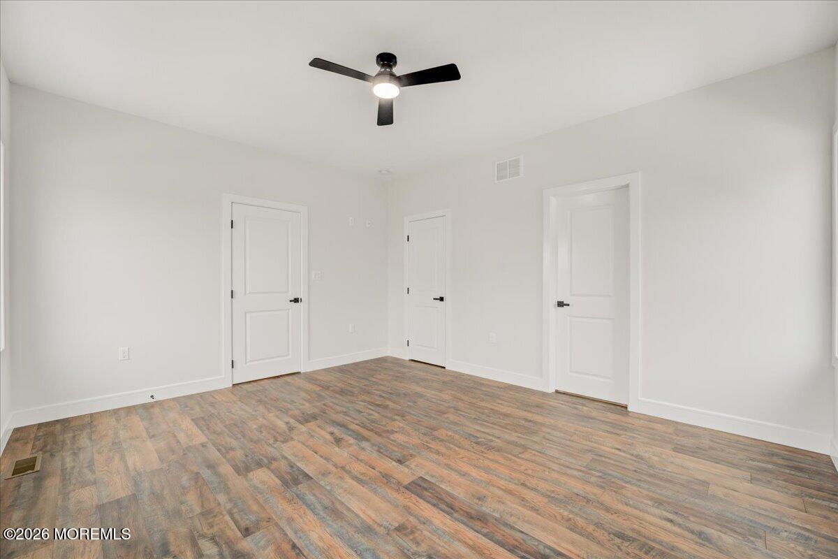 16 West Raritan Drive Little Egg Harbor, NJ 08087 - Photo 32 of 53 wooden floor in white room
