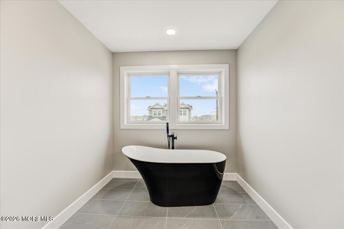 16 West Raritan Drive Little Egg Harbor, NJ 08087 - Photo 44 of 53 a room with a sink