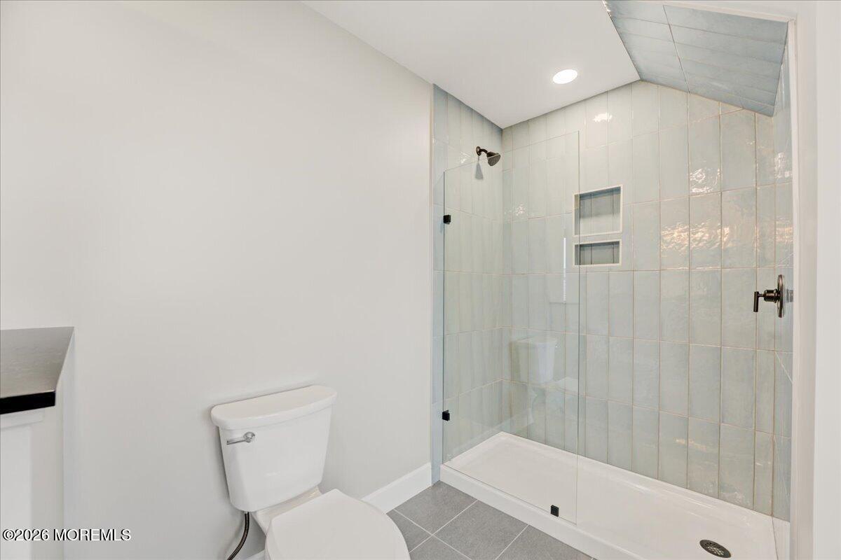 16 West Raritan Drive Little Egg Harbor, NJ 08087 - Photo 45 of 53 a bathroom with a toilet and a shower