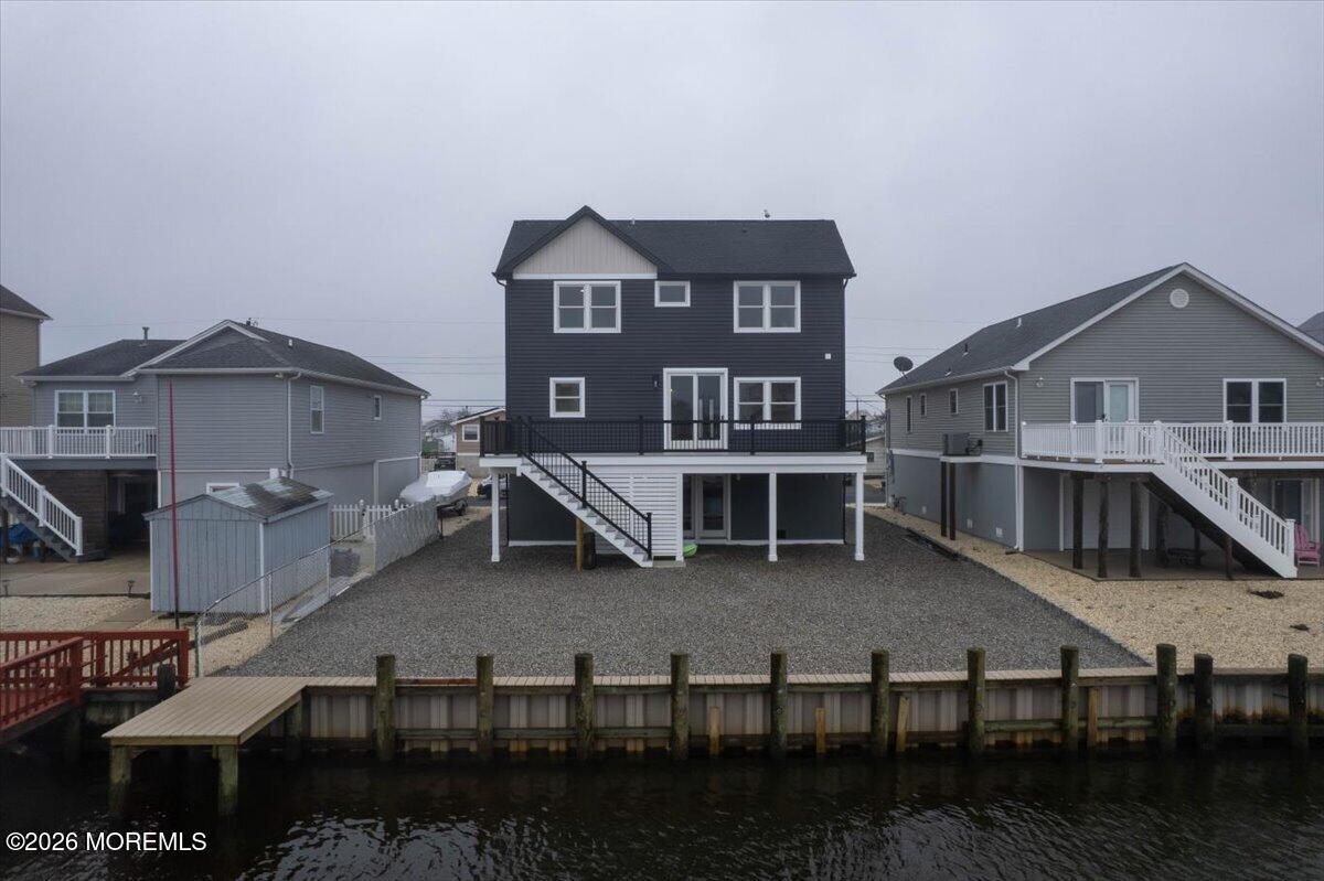 16 West Raritan Drive Little Egg Harbor, NJ 08087 - Photo 7 of 53 a view of a house with wooden deck