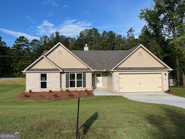 398 Riley Circle Northwest Milledgeville, GA 31061 - Photo 1 of 15 a view of a house with a yard