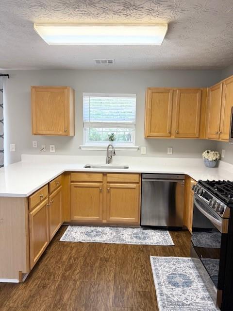 411 Sugar Maple Court Canton, GA 30114 - Photo 11 of 34 a kitchen with stainless steel appliances granite countertop a sink stove and cabinets