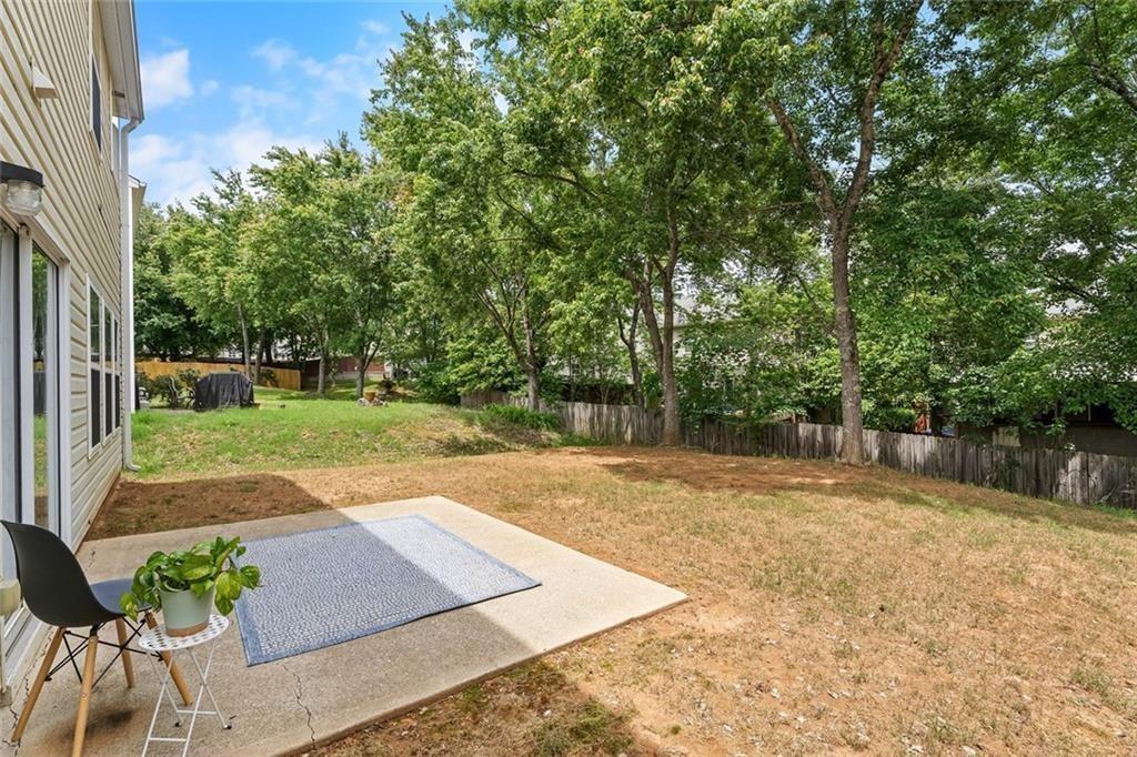 411 Sugar Maple Court Canton, GA 30114 - Photo 33 of 34 a view of a backyard