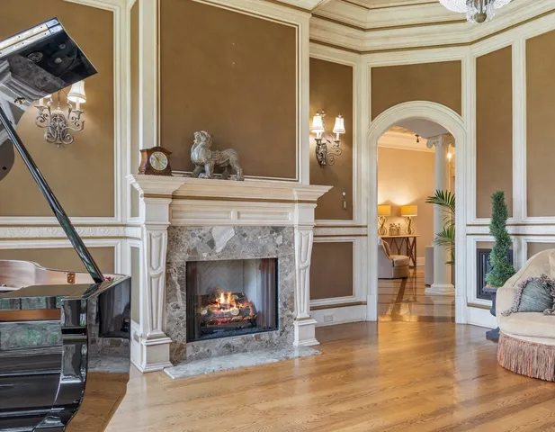 a kitchen with stainless steel appliances white cabinets and a refrigerator