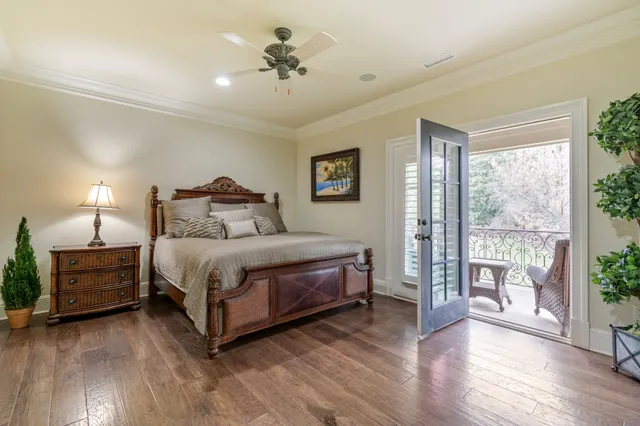 a utility room with stainless steel appliances kitchen island granite countertop a stove and a sink
