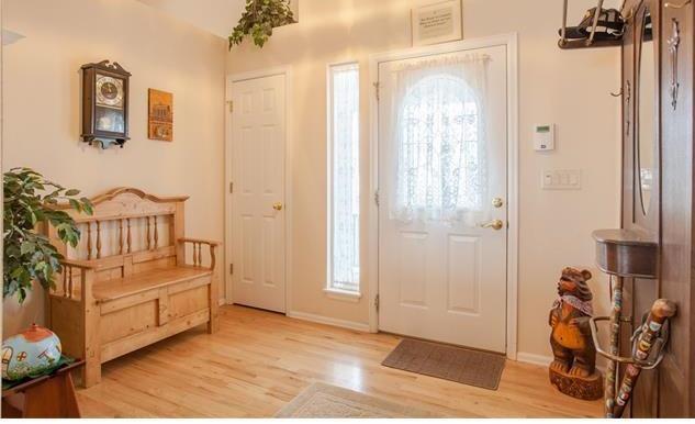 1038 Bowstring Road Monument, CO 80132 - Photo 2 of 25 a view of a bedroom with closet and windows