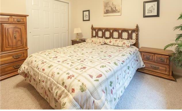 1038 Bowstring Road Monument, CO 80132 - Photo 20 of 25 a bedroom with a bed next to a window