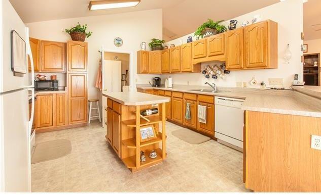 1038 Bowstring Road Monument, CO 80132 - Photo 8 of 25 a spacious bathroom with a granite countertop sink and a mirror