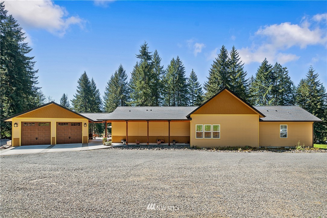 178 Jeffries Road Chehalis, WA 98532 - Photo 19 of 19 a front view of a house with a yard and garage