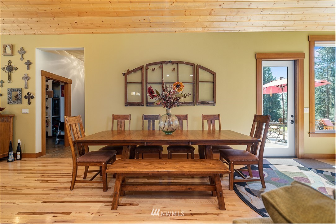 178 Jeffries Road Chehalis, WA 98532 - Photo 9 of 19 a view of a dining room with furniture and wooden floor