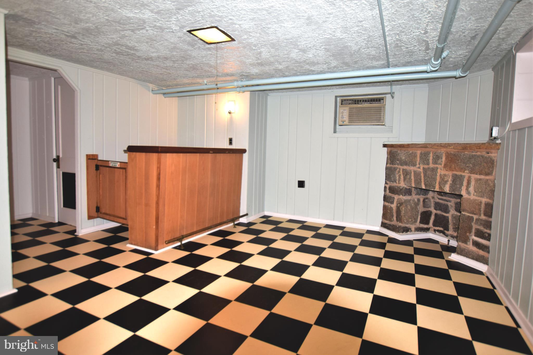2405 Brambleton Road Baltimore, MD 21209 - Photo 22 of 29 a black and white checkered floor