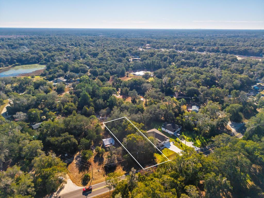 435 County Rd Mount Sorrento, FL 32776 - Photo 13 of 30 an aerial view of residential houses with city view