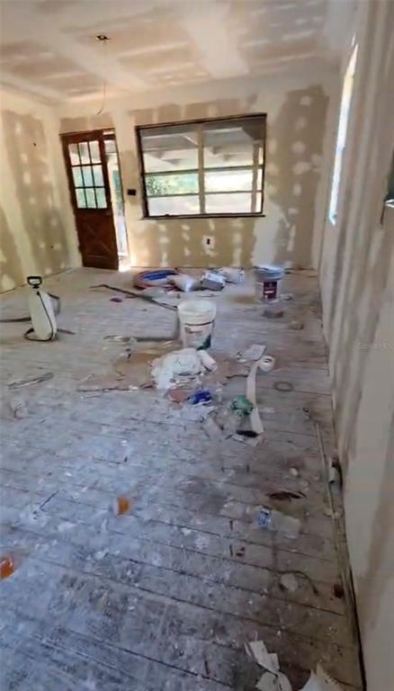 435 County Rd Mount Sorrento, FL 32776 - Photo 7 of 30 a view of a livingroom with wooden floor and a window