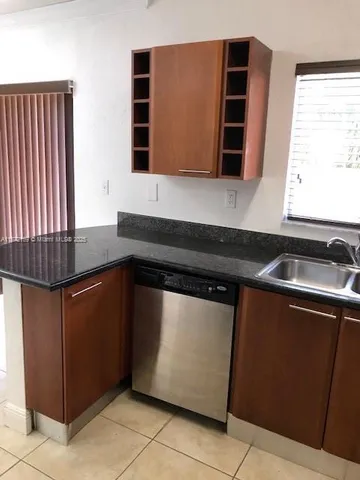 an empty room with mirror