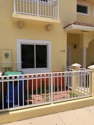 a bathroom with a sink and toilet