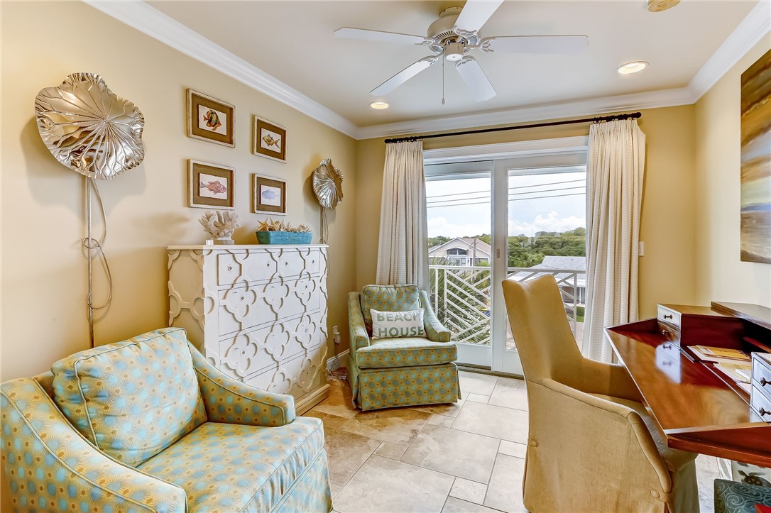 2384 South Fletcher Avenue Fernandina Beach, FL 32034 - Photo 12 of 35 a living room with furniture and a large window