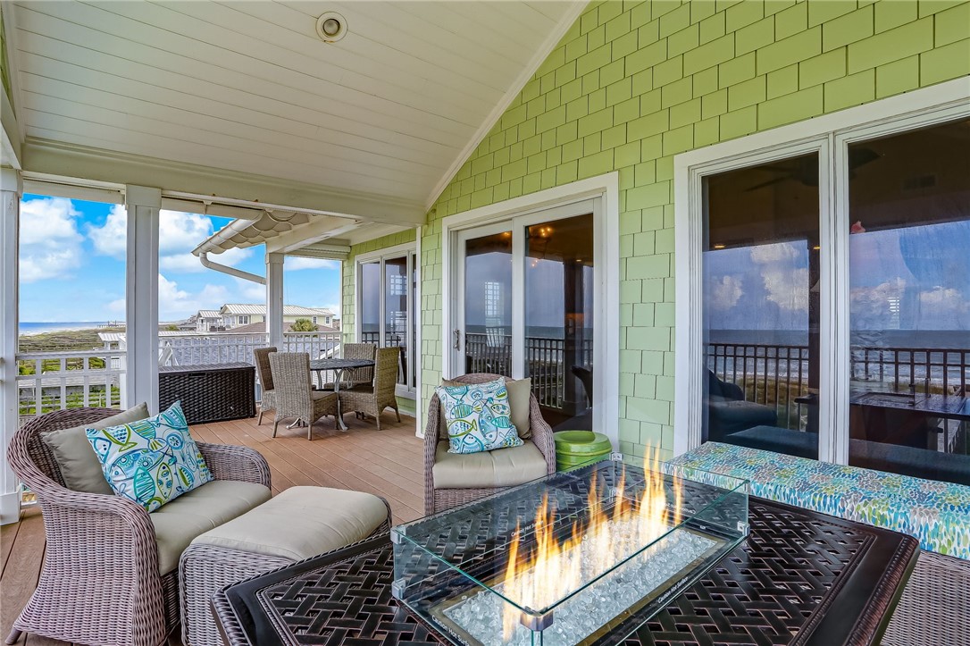 2384 South Fletcher Avenue Fernandina Beach, FL 32034 - Photo 19 of 35 a outdoor space with patio the couches and a dining table with the view of the balcony