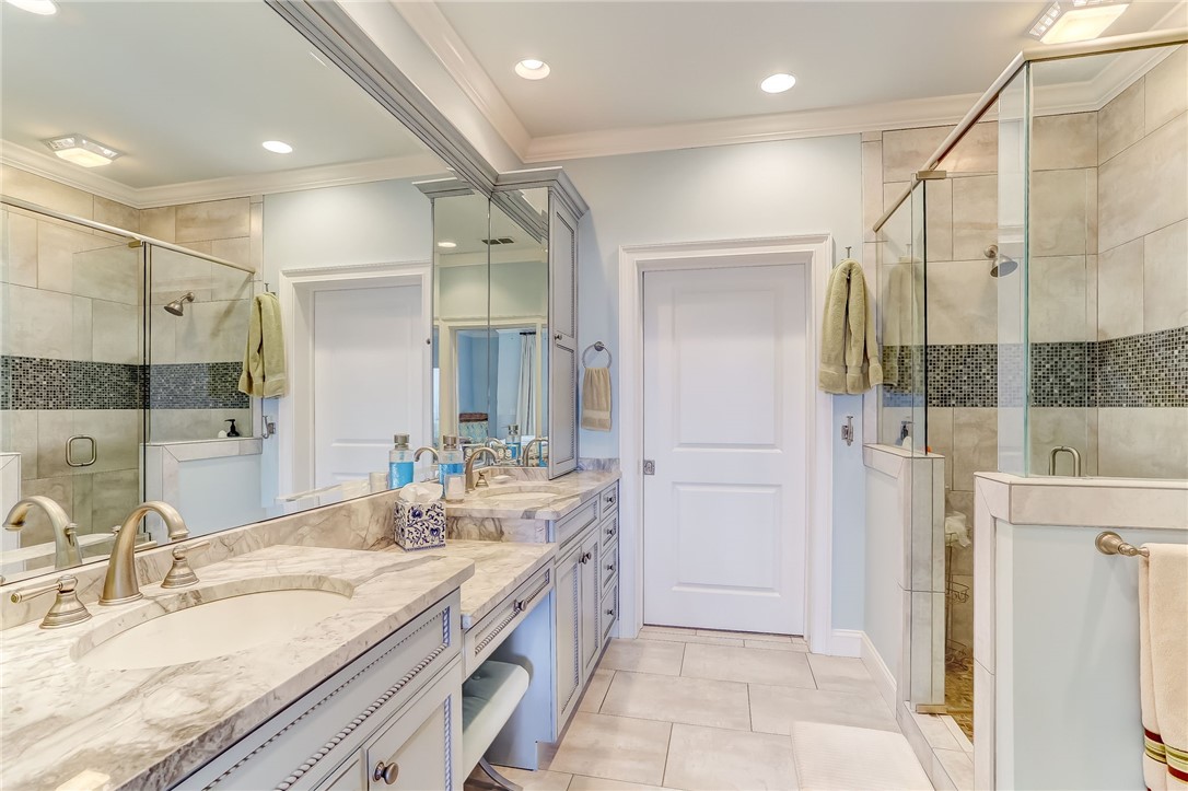 2384 South Fletcher Avenue Fernandina Beach, FL 32034 - Photo 22 of 35 a bathroom with a granite countertop sink mirror and double