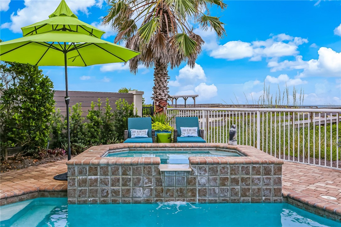 2384 South Fletcher Avenue Fernandina Beach, FL 32034 - Photo 33 of 35 a view of a chairs and table in the backyard