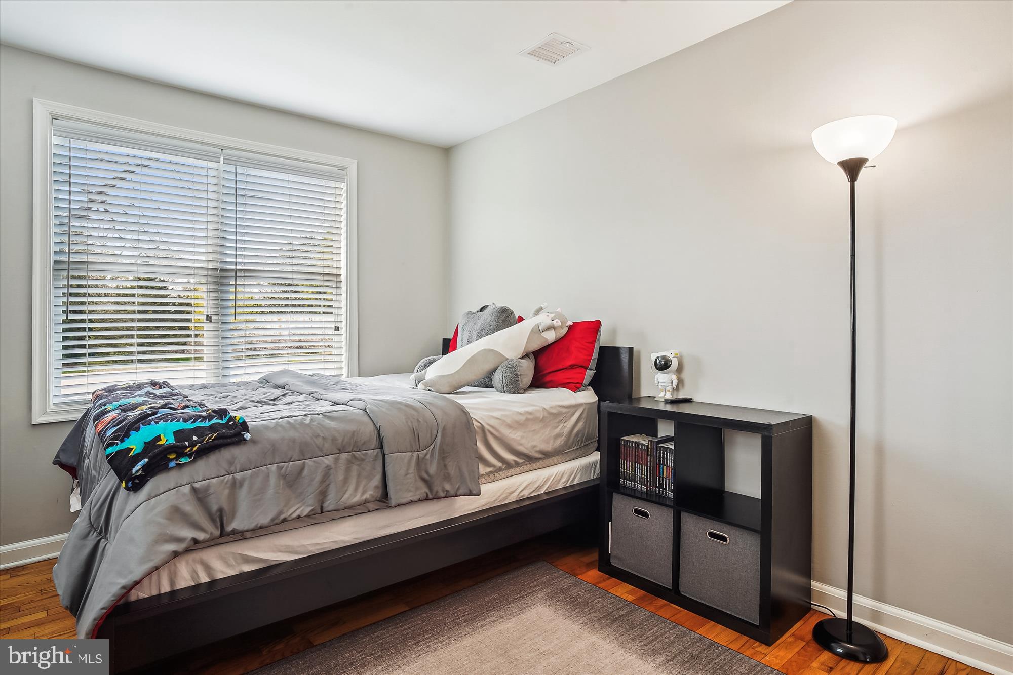 2554 Church Hill Road Centreville, MD 21617 - Photo 18 of 27 a bedroom with a bed and a potted plant