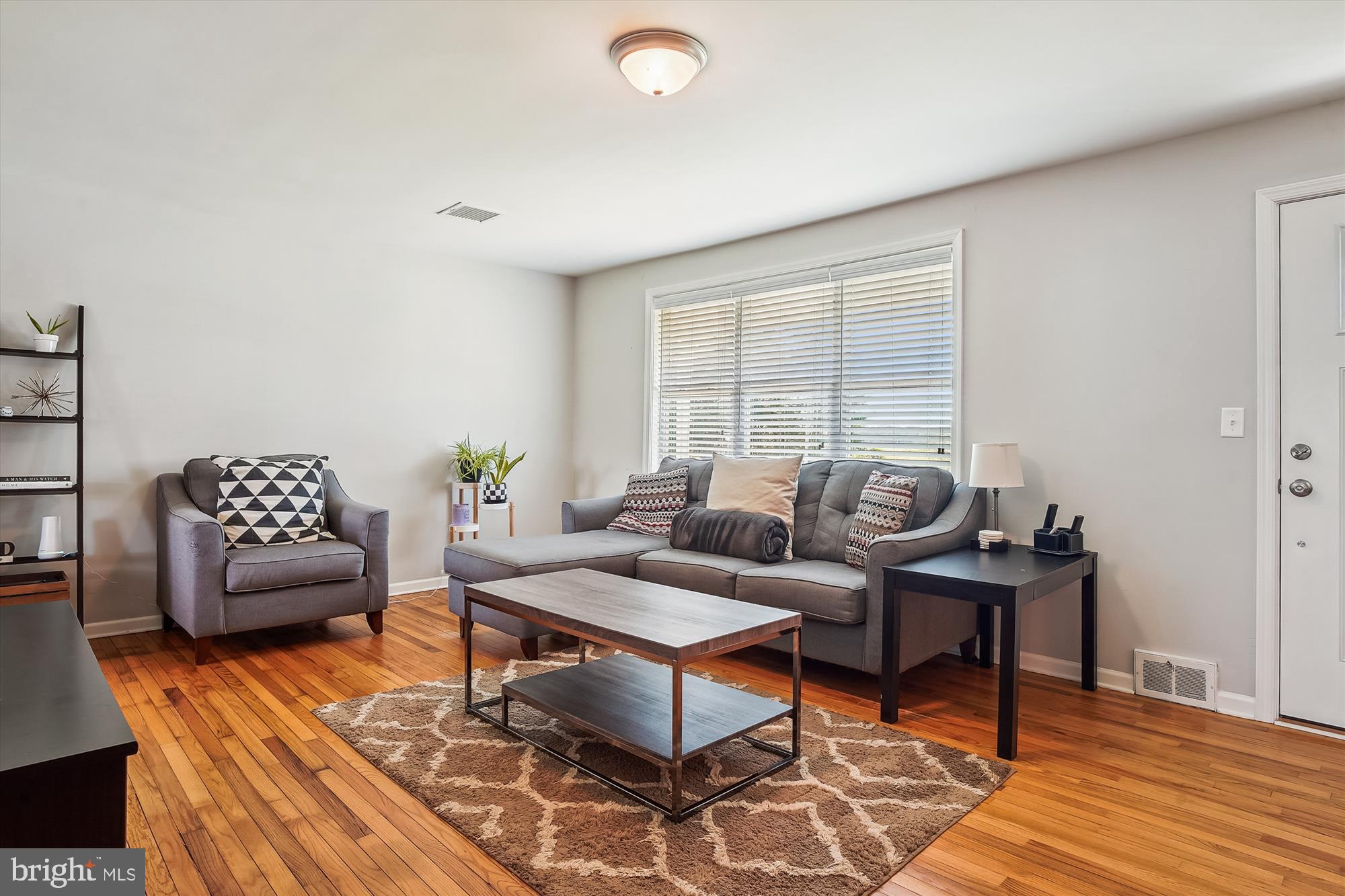 2554 Church Hill Road Centreville, MD 21617 - Photo 2 of 27 a living room with furniture and a wooden floor