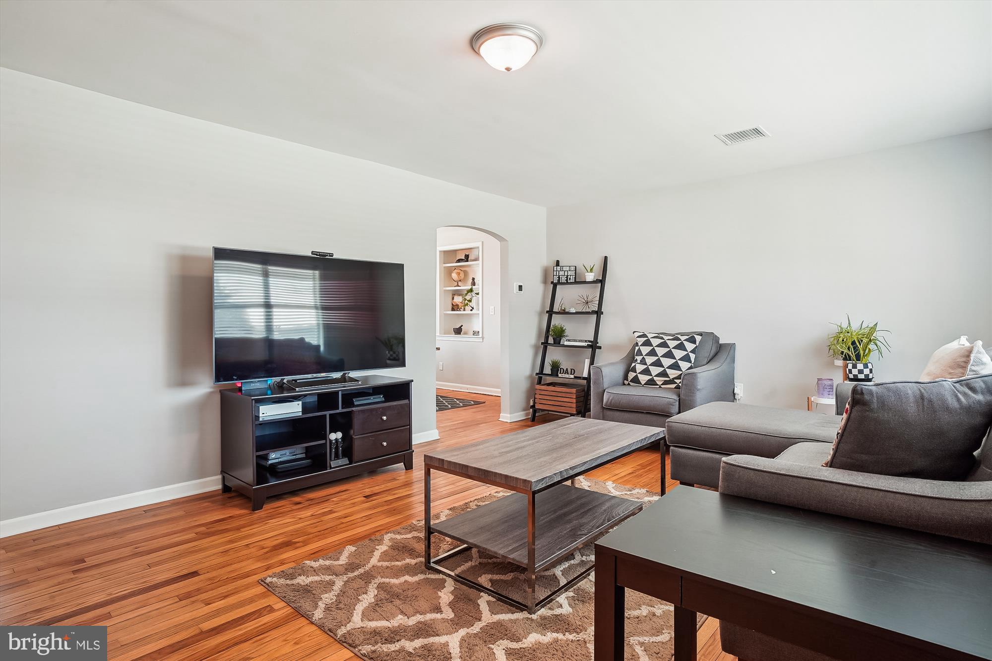 2554 Church Hill Road Centreville, MD 21617 - Photo 3 of 27 a living room with furniture and a flat screen tv
