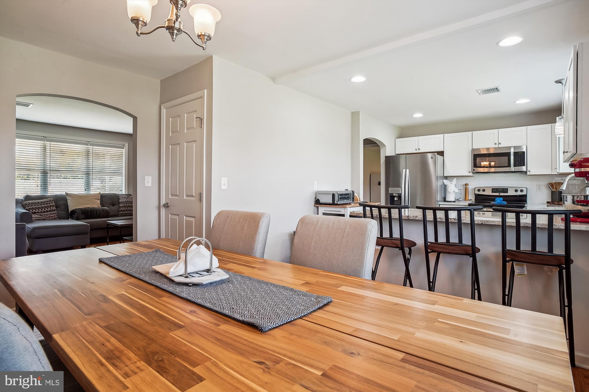 2554 Church Hill Road Centreville, MD 21617 - Photo 7 of 27 a view of a dining room with furniture and wooden floor