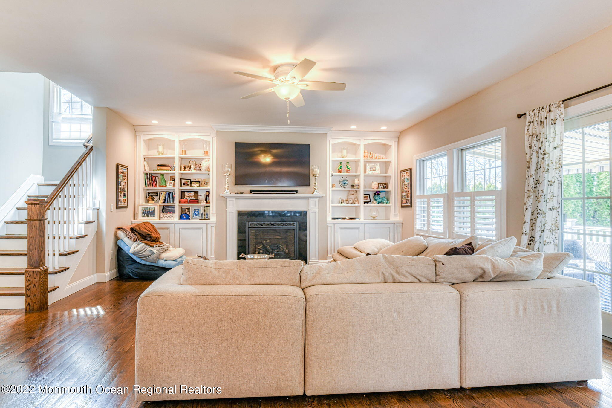 346 South Boulevard Spring Lake, NJ 07762 - Photo 16 of 56 a living room with furniture large window and a fireplace