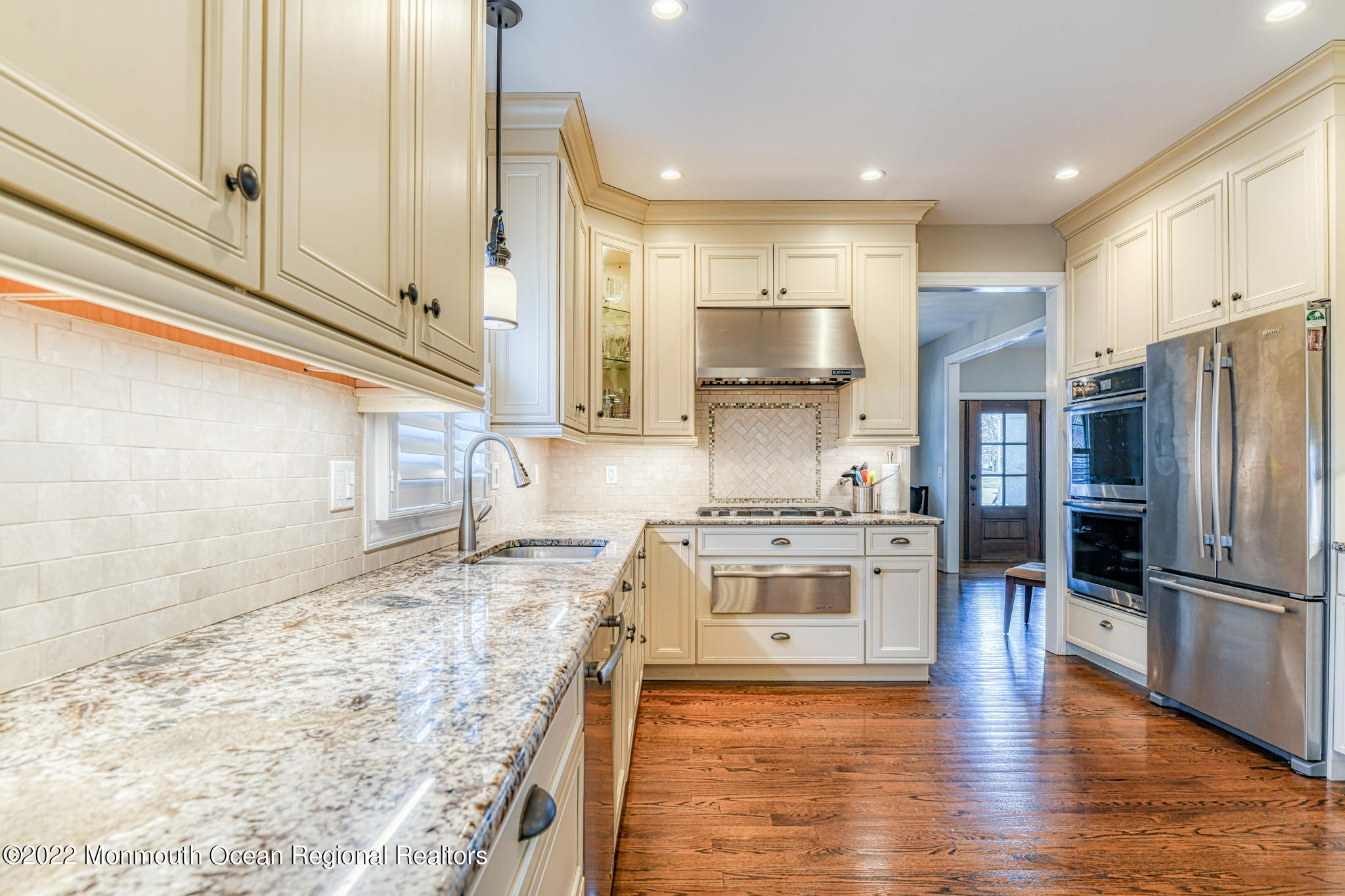 346 South Boulevard Spring Lake, NJ 07762 - Photo 23 of 56 a kitchen with stainless steel appliances granite countertop a refrigerator a stove and a sink