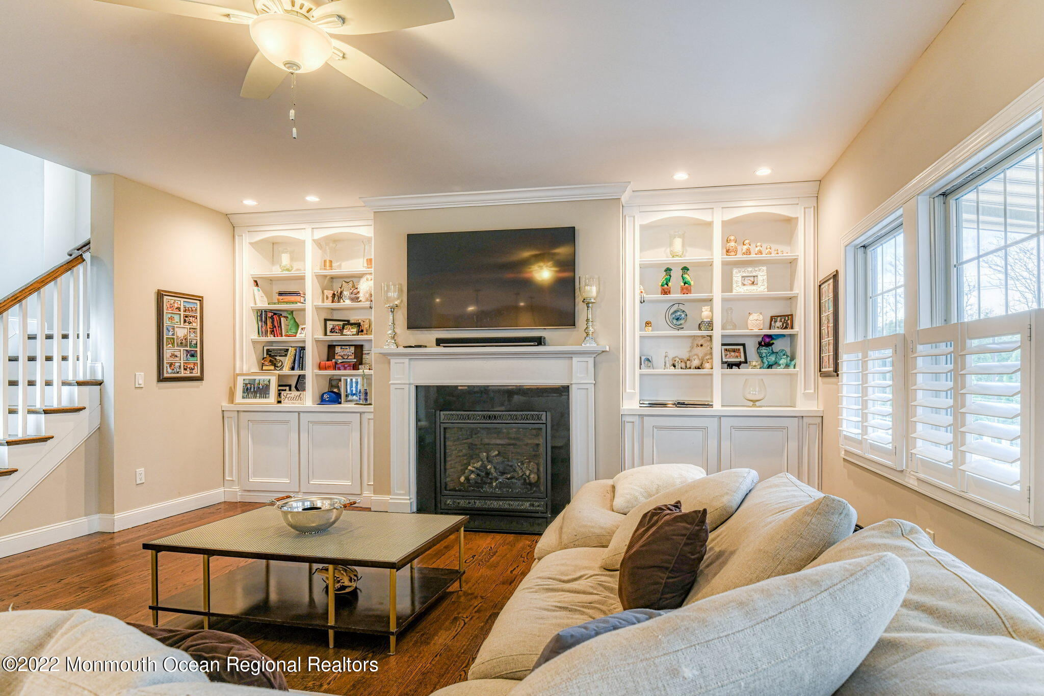 346 South Boulevard Spring Lake, NJ 07762 - Photo 29 of 56 a living room with furniture a flat screen tv and a fireplace