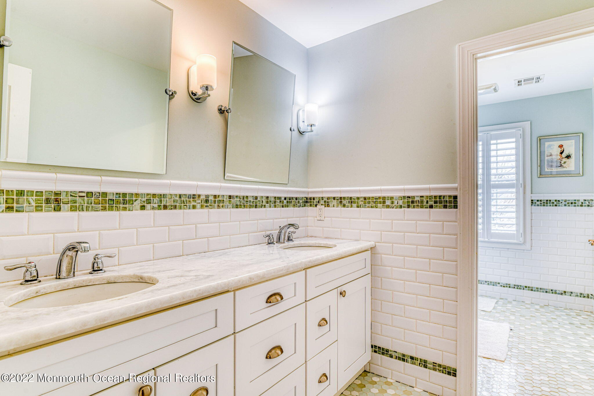 346 South Boulevard Spring Lake, NJ 07762 - Photo 31 of 56 a bathroom with a sink and a mirror