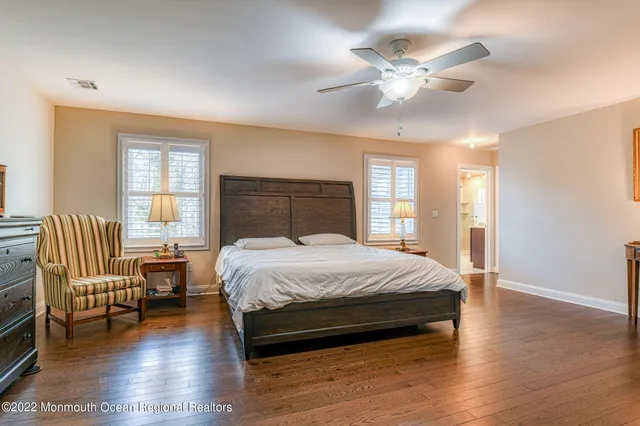 a bathroom with a tub and shower