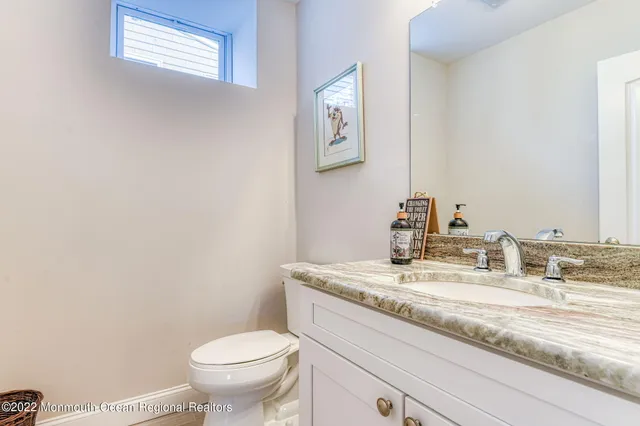 a view of a living room and a floor to ceiling window