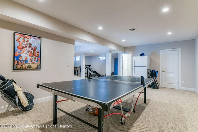 a view of a yard with yellow house