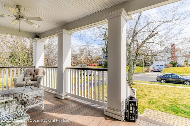 a view of balcony with wooden floor