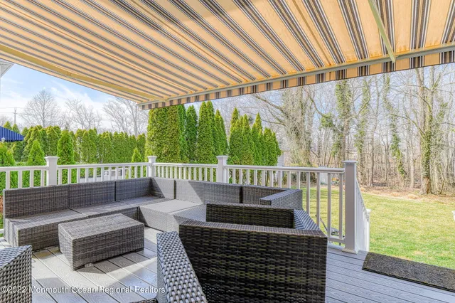 an aerial view of multiple houses with city view