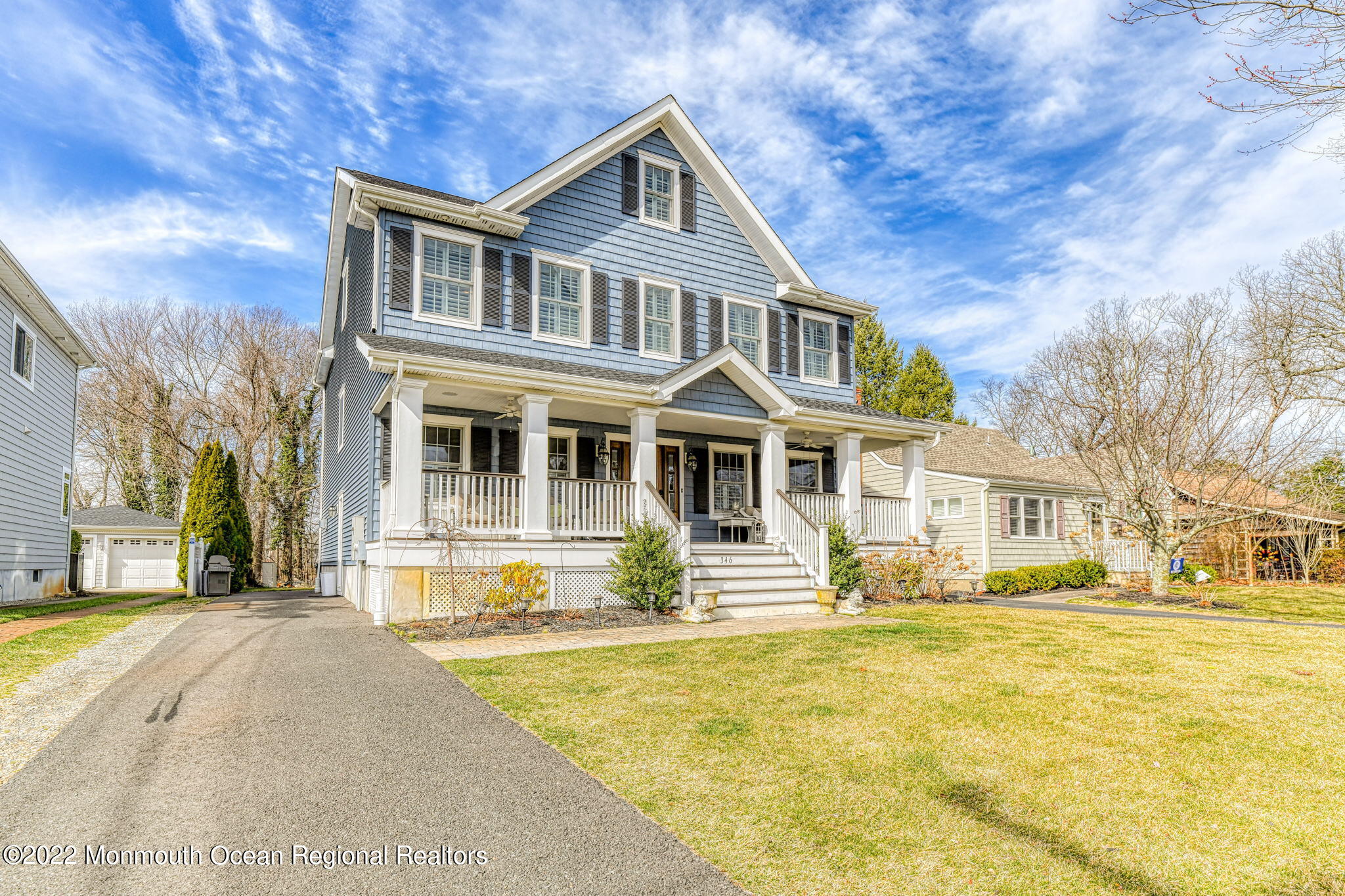 346 South Boulevard Spring Lake, NJ 07762 - Photo 50 of 56 a front view of a building with a garden