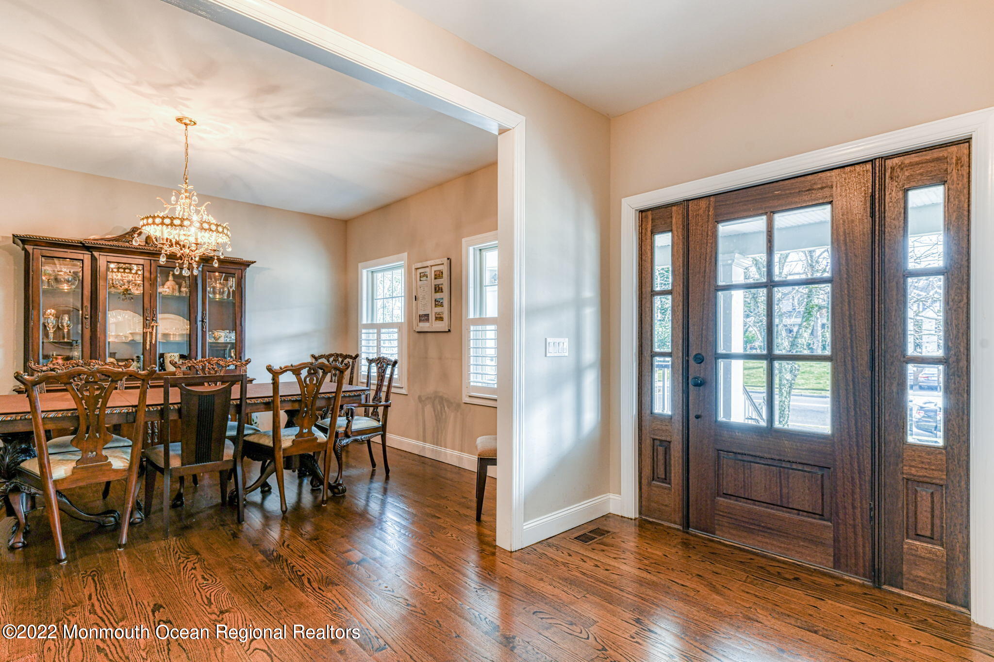 346 South Boulevard Spring Lake, NJ 07762 - Photo 10 of 56 a view of a dining room with furniture window and wooden floor