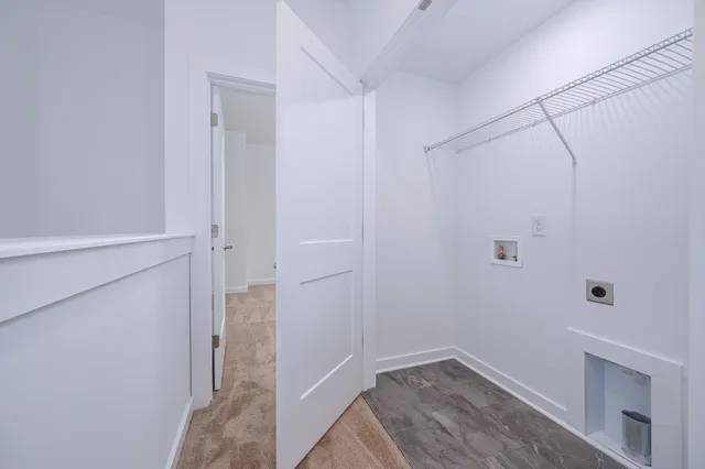 a view of hallway with closet