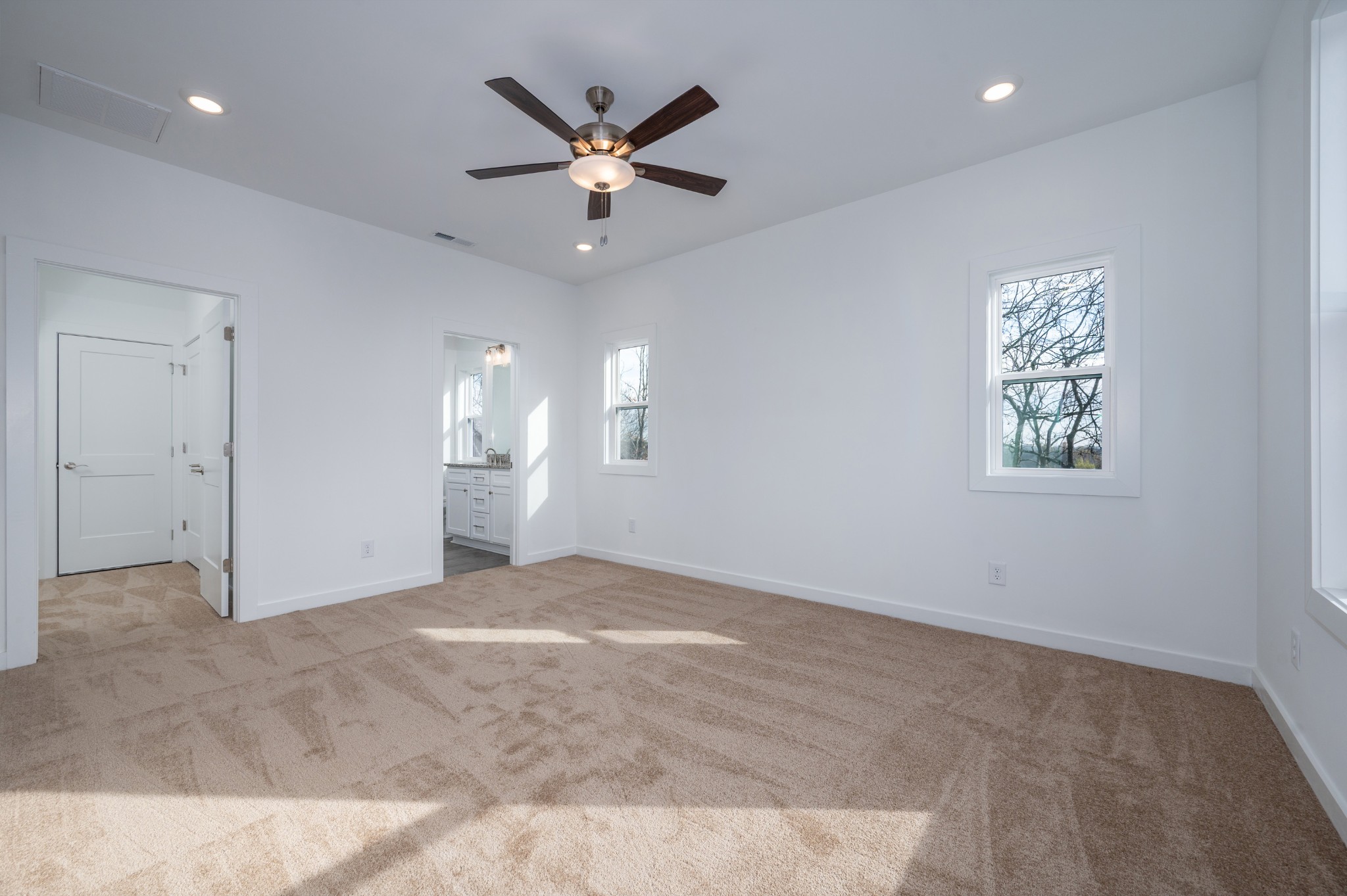 1170 Dickerson Road, Unit 22 Goodlettsville, TN 37072 - Photo 20 of 34 an empty room with fan and windows