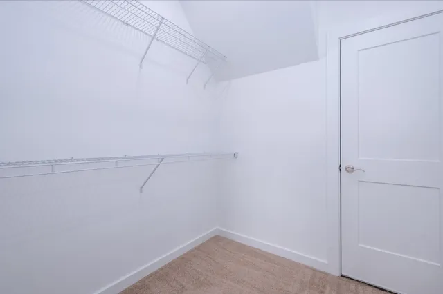 a view of a room with porch and wooden floor
