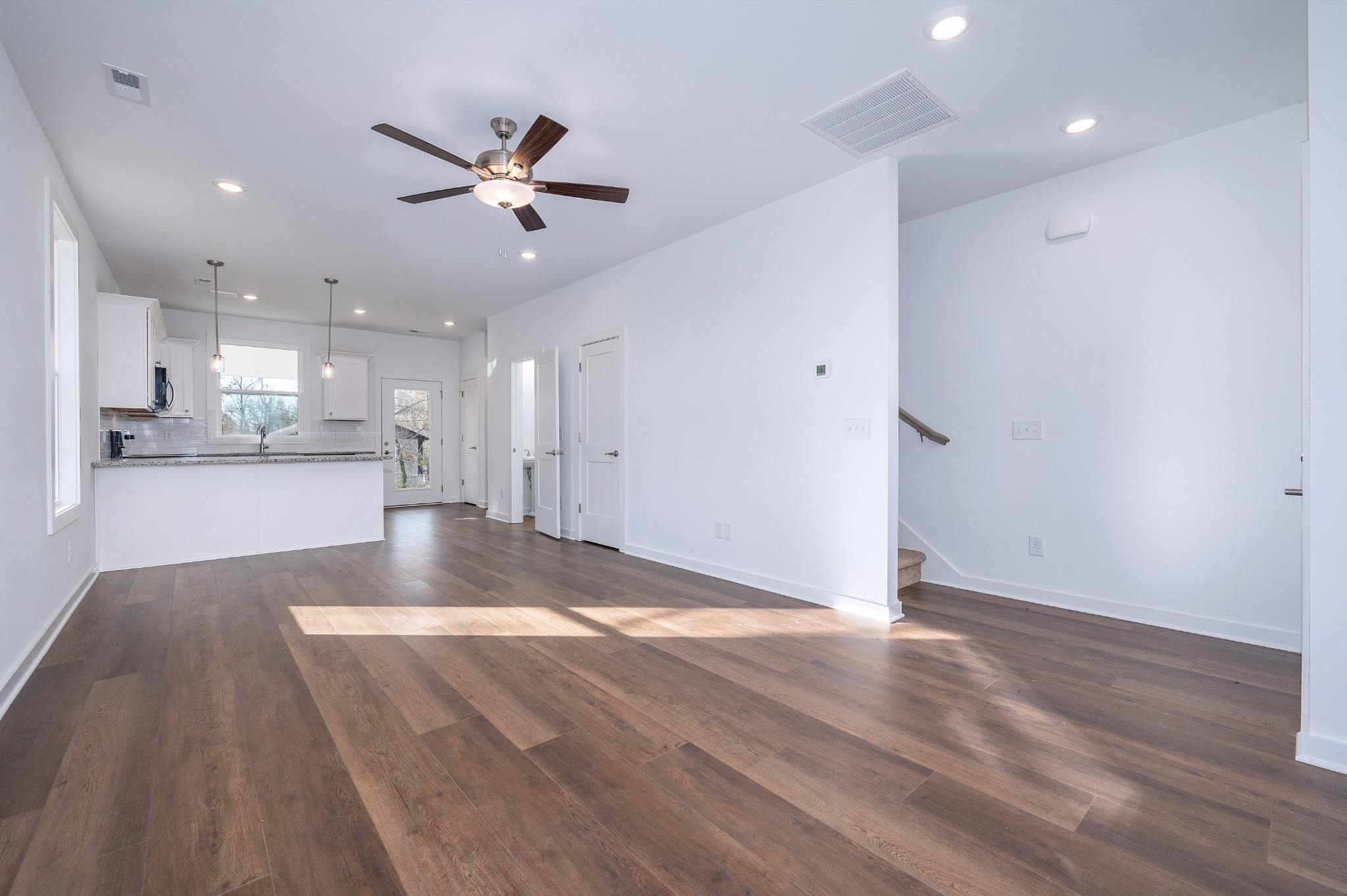 1170 Dickerson Road, Unit 22 Goodlettsville, TN 37072 - Photo 3 of 34 a view of a kitchen with a sink and dishwasher a refrigerator with wooden floor