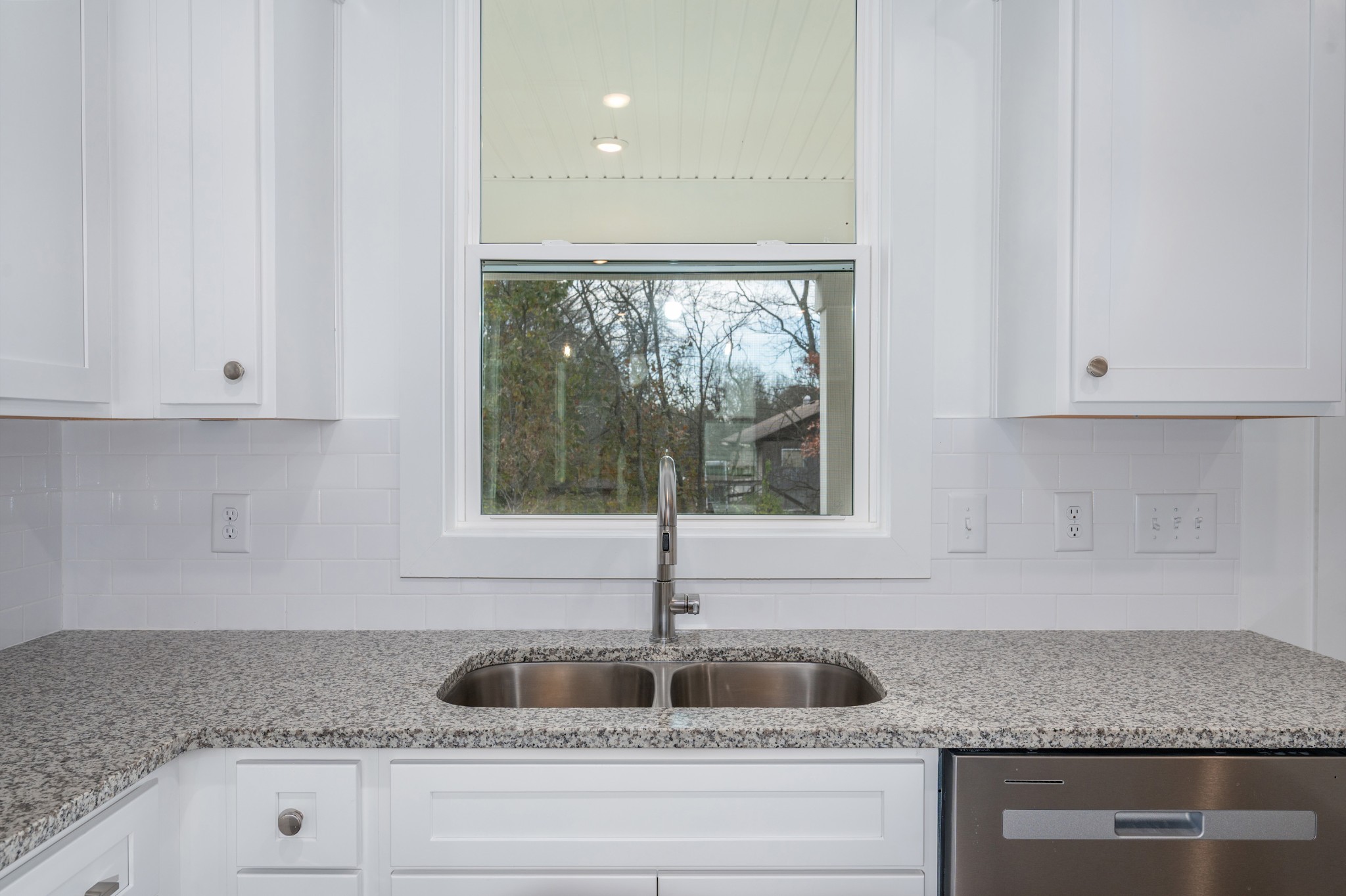 1170 Dickerson Road, Unit 22 Goodlettsville, TN 37072 - Photo 9 of 34 a kitchen with granite countertop white cabinets and a sink