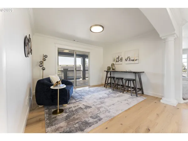 a living room with furniture and a table