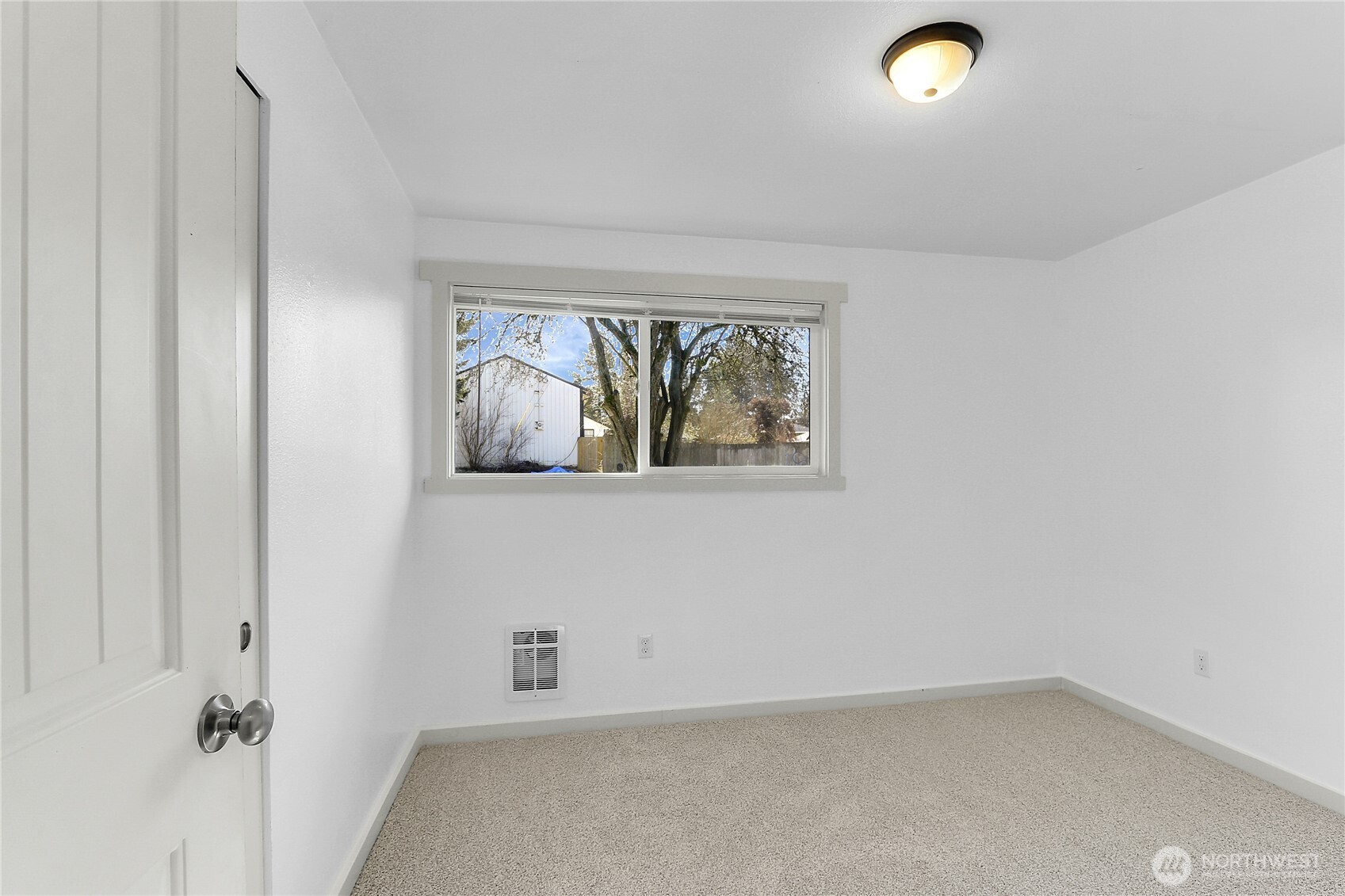 2115 Pinehurst Avenue Everett, WA 98203 - Photo 13 of 18 an empty room with windows