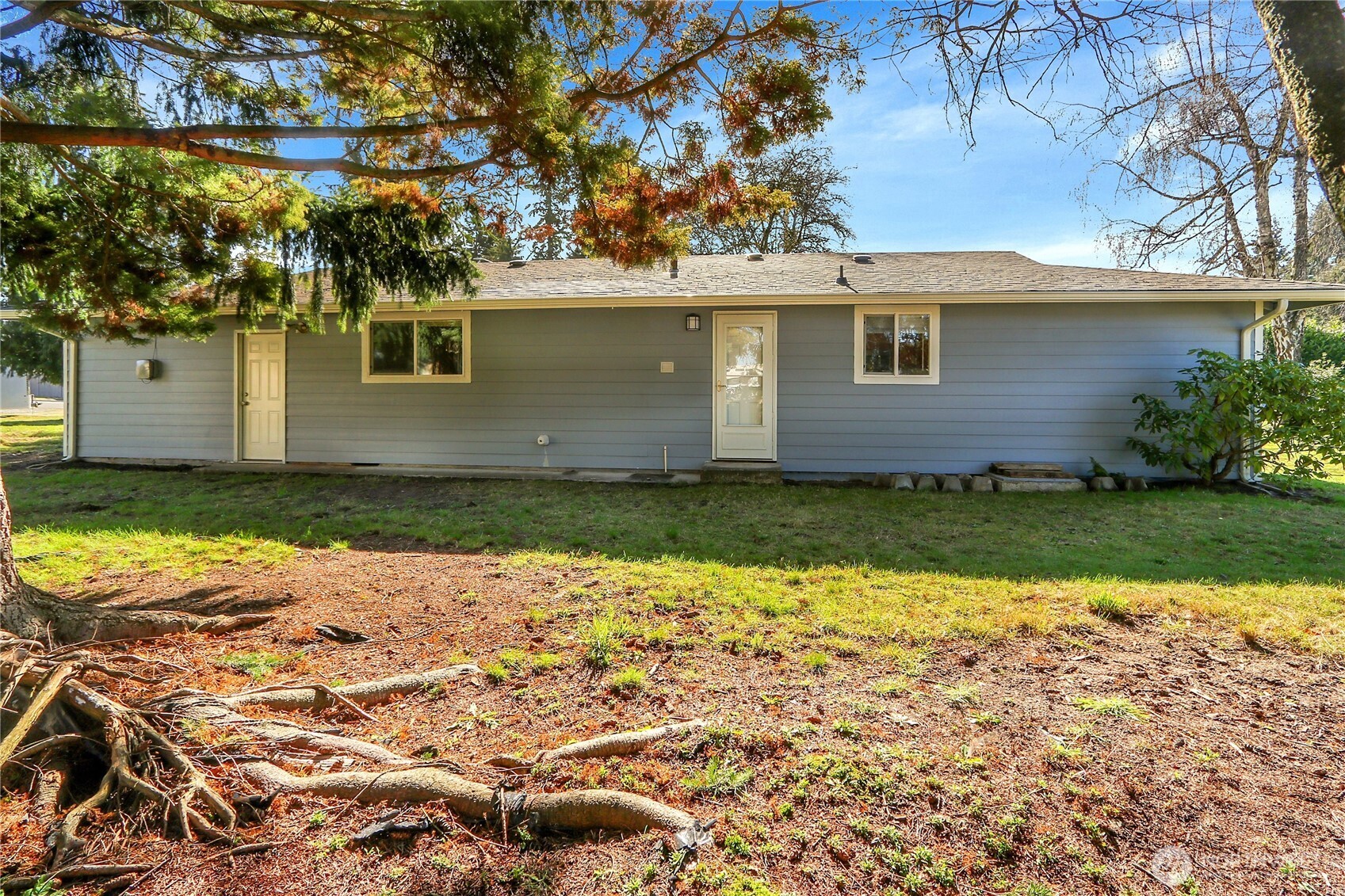 2115 Pinehurst Avenue Everett, WA 98203 - Photo 17 of 18 a view of a house with a yard