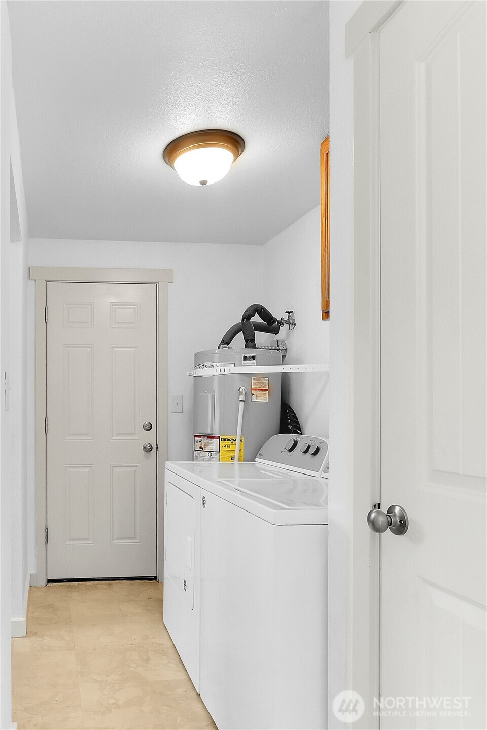 2115 Pinehurst Avenue Everett, WA 98203 - Photo 10 of 18 a utility room with washer and dryer