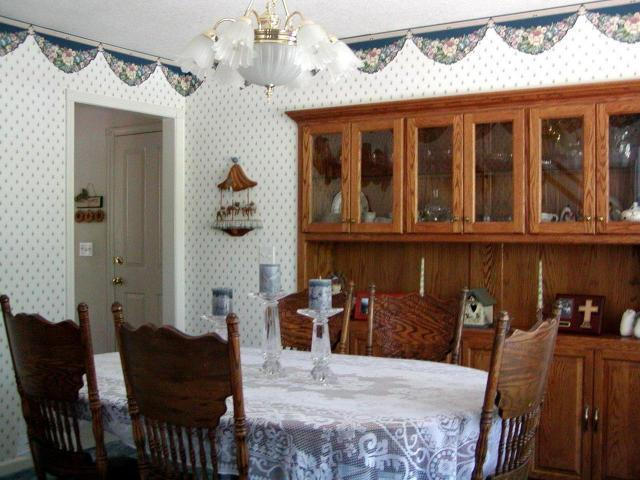 8277 Placer Road Redding, CA 96001 - Photo 2 of 9 a view of a dining room with furniture